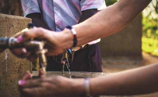 Women washing hands